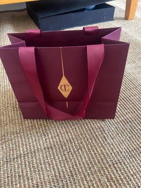 Charlotte Tilbury Wine-Red Gift Bag with Gold CT Emblem